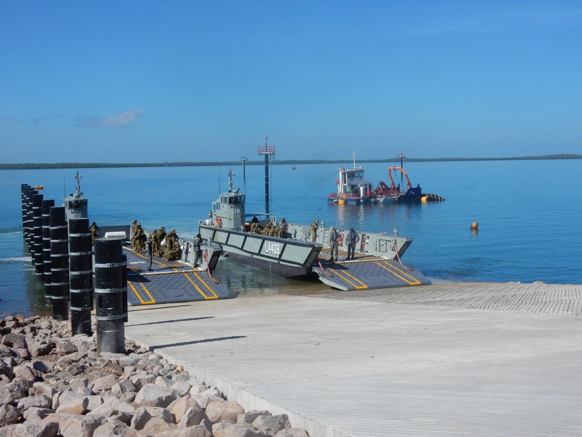 Landing craft and personnel at marine access ramp within the Marine Industry Park site in Darwin