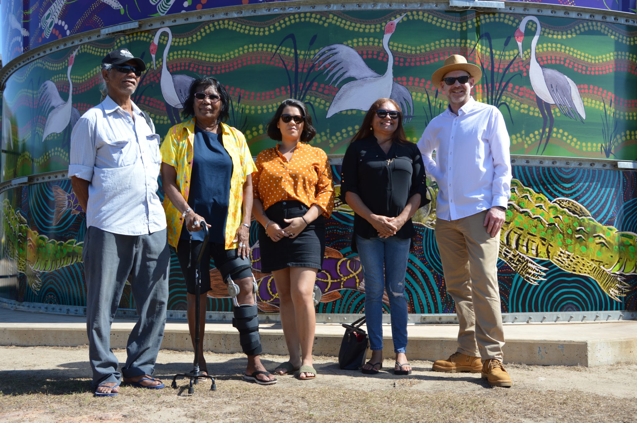Larrakia Artists: Tibby Quall, Denise Quall, Tessna Dwyer and Norma Benger, with Rob Jager, VP Prelude Shell Australia.